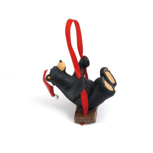 Novelty ornament featuring a miniature black boot with red laces and heels.