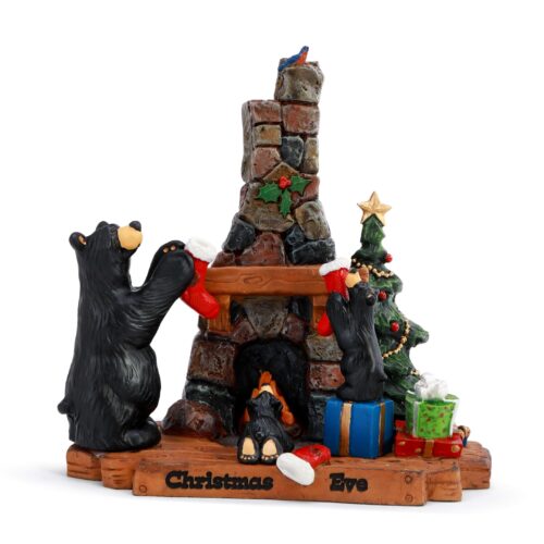 Christmas bear figurine decorating a fireplace with gifts and a tree.