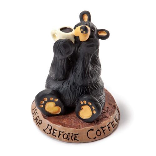 A black bear figurine holding a coffee cup with 'Before Coffee' base.