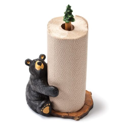 A bear-shaped paper towel holder with a pine tree decoration.