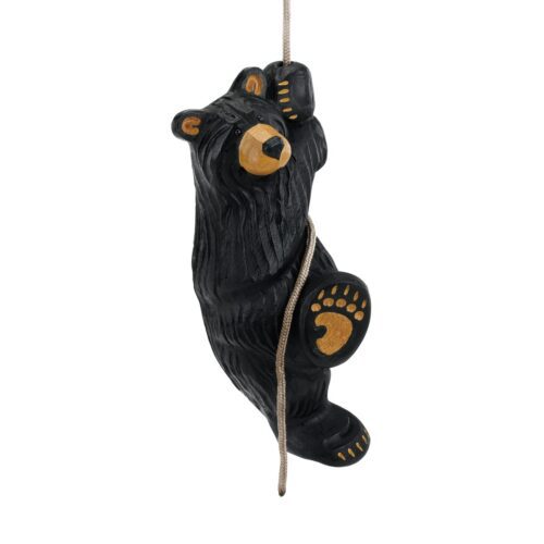 A black bear figurine climbing a rope with detailed paws and face.