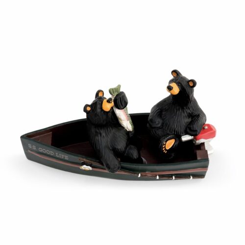 Two black bear figurines sitting in a small boat, one holding binoculars.