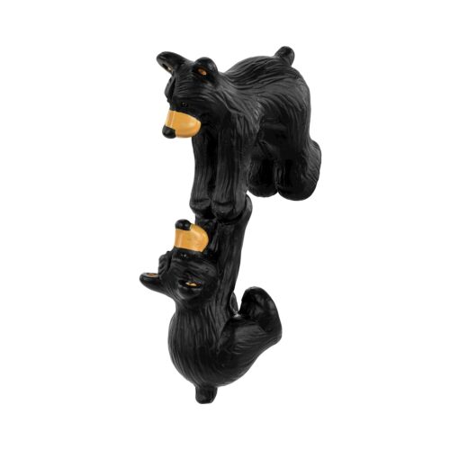 Two black squirrels figurines stacked vertically.