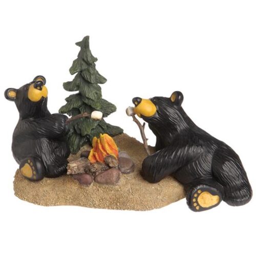 Two bear figurines around a campfire with a tree.