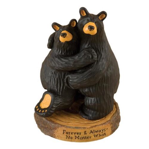 Figurine of two hugging bears on a wooden base.
