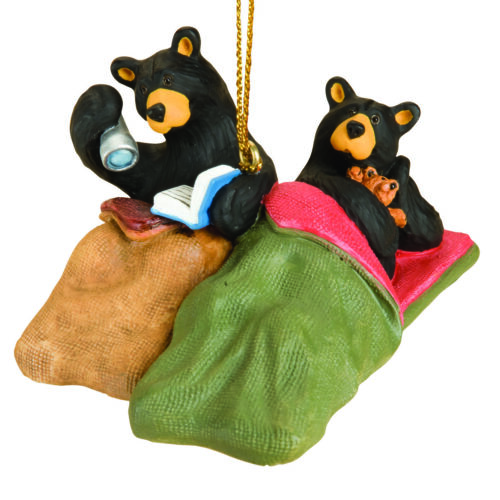 Two bear figurines in colorful sleeping bags hanging as ornaments.