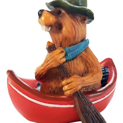 A bear figurine paddling a red canoe.
