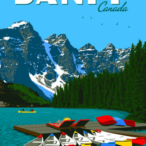 Colorful canoes docked by a lake with snowy mountains and pine trees in the background.