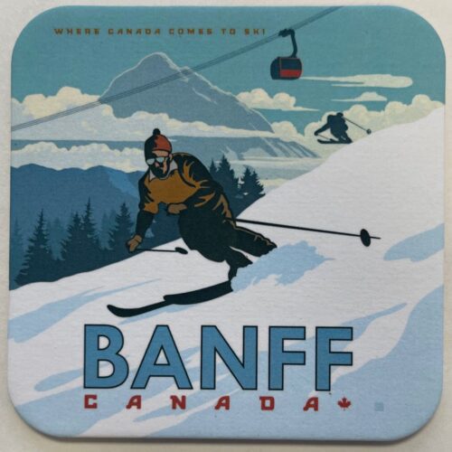 Vintage ski poster of Banff, Canada with a skier in snowy mountains.