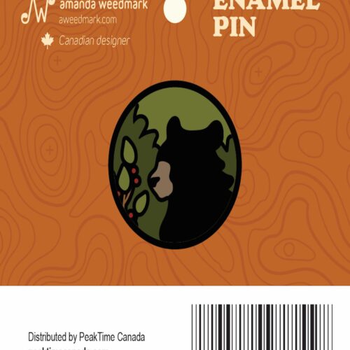 Enamel pin featuring a green and black abstract design on an orange background.
