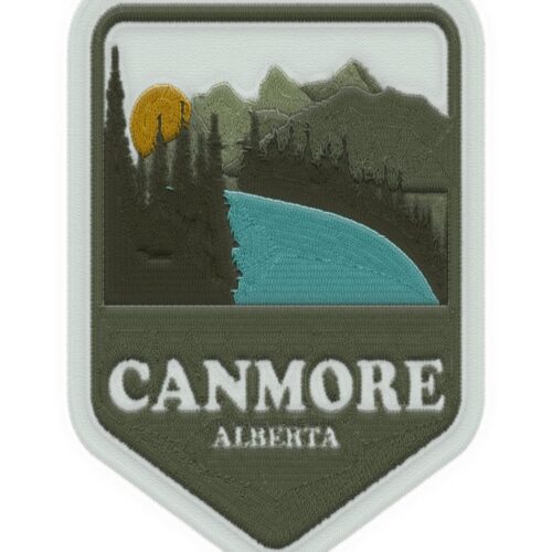 A Canmore, Alberta patch featuring mountains and a river.