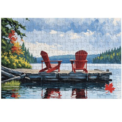 Two red chairs on a dock overlooking a calm lake and forest.