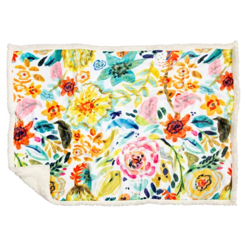 Colorful floral patterned blanket with a soft texture.